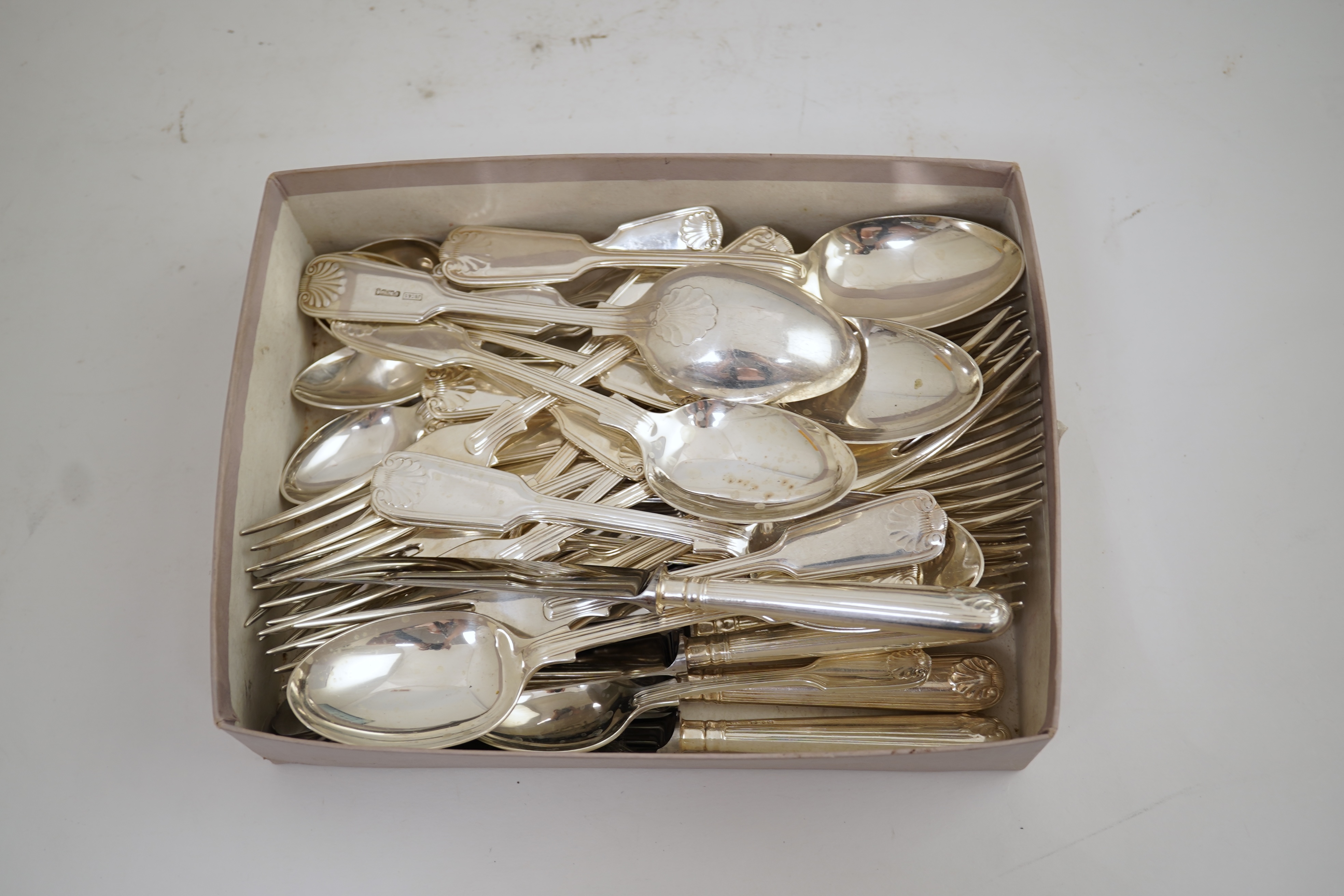 An Elizabeth II part canteen of silver fiddle, thread and shell pattern cutlery, by J B Chatterley & Sons Ltd